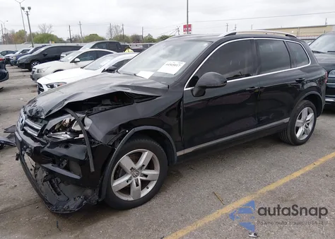 2012 Volkswagen Touareg Tdi Lux z USA, uszkodzony, nr VIN WVGFK9BP7CD004140